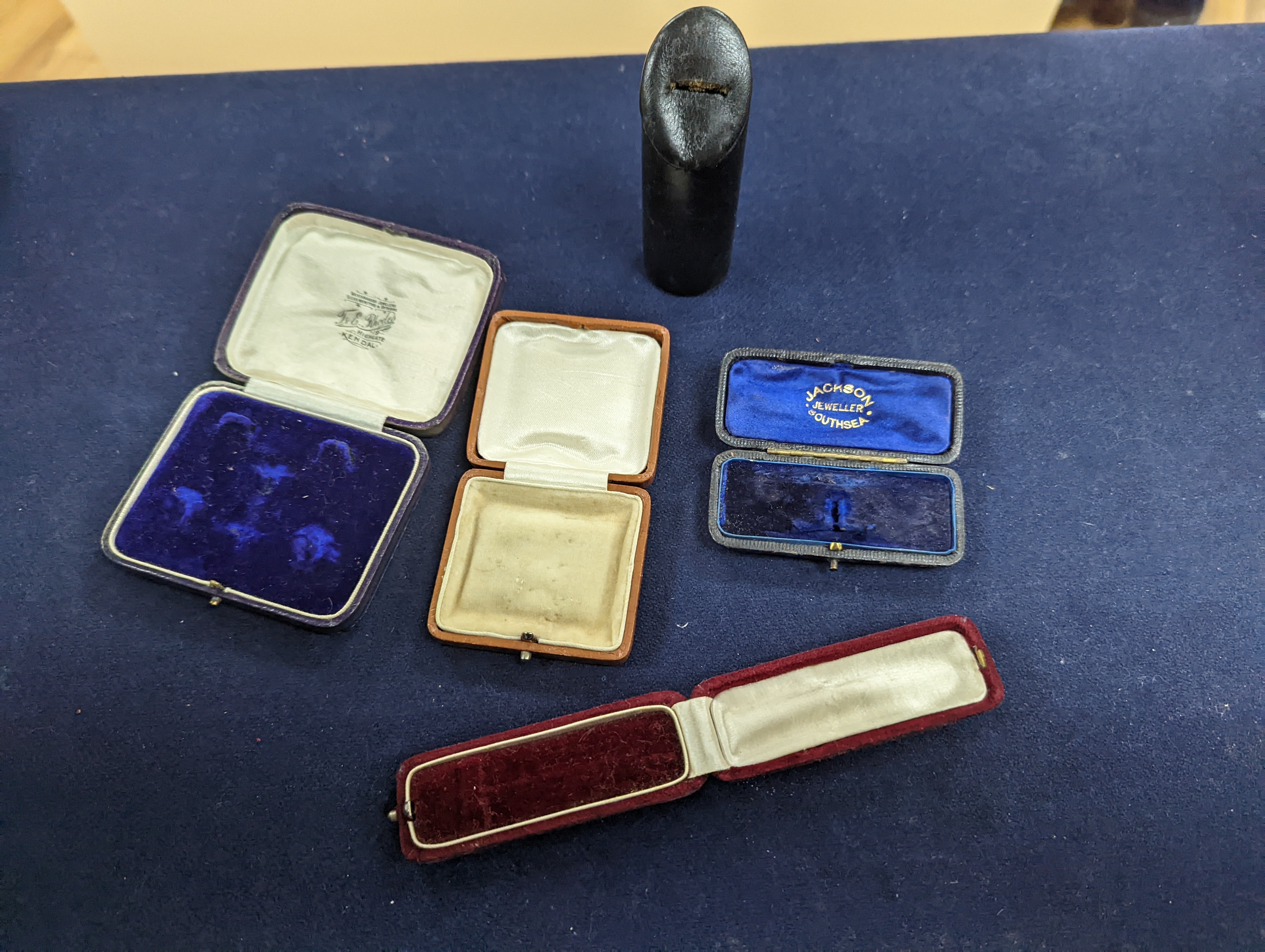 Two Art Deco advertising powder boxes, a similar pack of cards, two fans, leather jewellery boxes, vintage serviettes, etc.